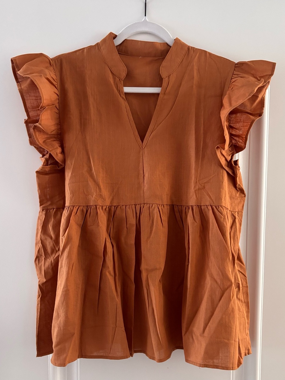 Rust Ruffle Sleeve Peplum Top